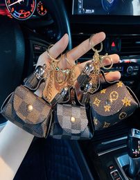 Leather Key Chains Rings Jewelry Brown Flower Plaid Tassel Coin Purse Keyrings Holder Fashion Mini Storage Handbag Keychains Acces4591301