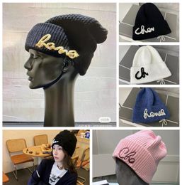 Designer beanie bronzing shiny letters knitted hat winter cap pearl decoration Knitted hats Ski outdoor windproof and warm very ni6188584