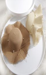 Female Summer Wave Wavy Edge Straw Hat Along Pearl Bow Big Along Hat Korean Travel Beach Sunscreen Hat Whole7624372