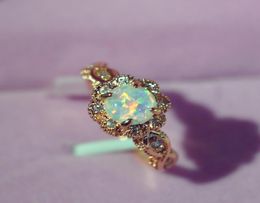 Whole Rose Gold Colour Flower Shape Women Finger Rings White Fire Opal CZ Fashion Party Jewellery Women Opal Rings Size 610 bag3913612