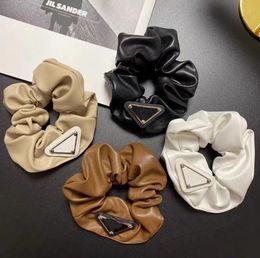 Fashion women girl womens Hair Rubber Bands Hairs Scrunchy Ring Clips Elastic Inverted triangle designer Sports Dance Scrunchie Ha2812444