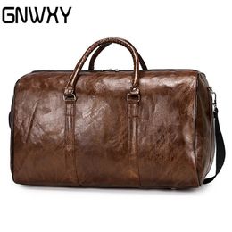 GNWXY Soft Leather Men Women Travel Bag Large Luggage Bags Travel Shoulder Bag Male Female Short-distance Lightweight Duffel Bag 231226