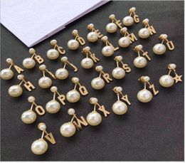 26 letter pearl stud female brass stud ornament01234569209933