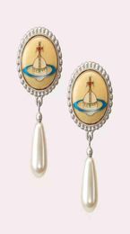 earrings Empress Dowager an enamel planet Pearl Earrings court WindNet red same temperament female6526197