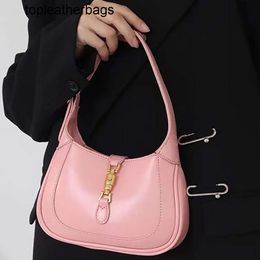 Mini buckle 1961 French horse underarm bag women's 2022 spring and summer new texture niche saddle messenger bag