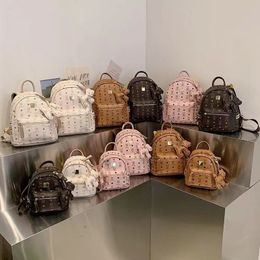 Mini shoulder bag female 2023 new casual small backpack Joker multi-purpose shoulder slung small bag.