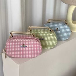 18% OFF Designer bag Empress Dowager Embroidery Saturn Plaid Oval Camera Bag Crossbody Handbag Macaron Sweet and Cute Commuter