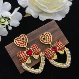 Diamond inlaid bow heart-shaped earring women's gold zircon small fresh with S925 silver earrings temperament