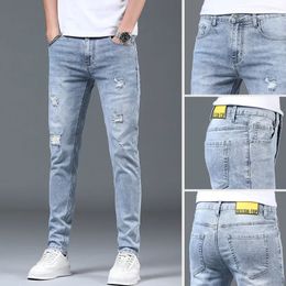 Spring Summer Stylish Korean ripped hole Stretch Men's Slim Work Denim Pants with Distressed Design Blue Casual Jeans Luxury Men 231228