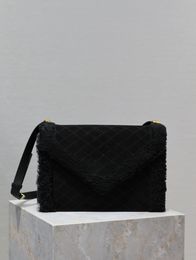 Quilted pattern envelope bag, black suede with lamb wool style