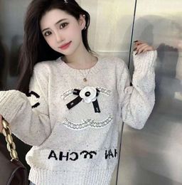 Luxury fashion burst cc high version new heavy woven flower accessories color grain mixed wool yarn long sleeve sweater 555