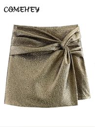 Vintage Shiny Mini Skirt For Women Irregular Bow Party 2024 Solid Skirts Female Chic Package Hip Sparkling Short Trouser skirts 231228