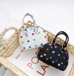 Kids Handbags Korean Fashion Little Girls Princess Purses Gifts Toddler Baby Mini Messenger Bags Classic Printing PU Leather Shell Shoulder Bag8340694