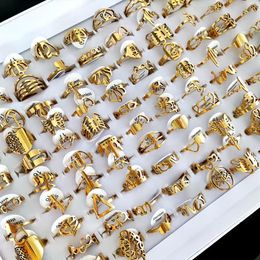 100pcs lot Laser Cutting Rings for Women Styles Mix Gold Stainless Steel Charm Ring Girls Birthday Party Favour Female Beautiful Je172s