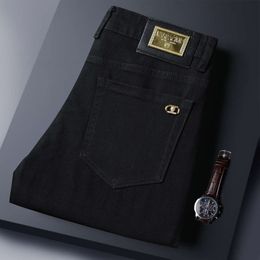 Jeans preto puro fino de verão, ajuste fino masculino, pés pequenos, calças casuais elásticas, versátil Vasaki VIP genuíno