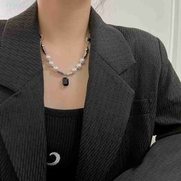 2024 DESIGNERS Light luxury minority Black Pendant pearl titanium steel necklace men's and women's fashion hip-hop versatile sweater chain Jewellery