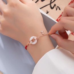 On shore Koi Hotan Jade Safe Buckle Bracelet Female Sterling Silver Red Rope Life Year Transfer Pearl Hand Rope for Girlfriend