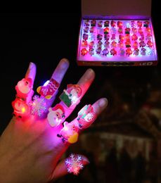 10pcs Christmas Glow Rings In Dark Flash Brooch Toy LED Santa Snowman Shine Toys Party Child Gift Navidad Party Decoration9612330