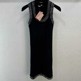24 Early Spring New Miu Nanyou Classic Trendy Black Paired with Sequin u Neck for Slimming and Versatile Knitted Skirt