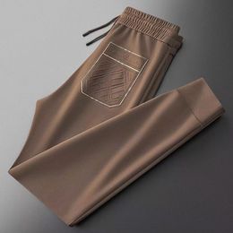 Designer Mens Pocket Embroidered Badge Jogging Sports Pants Womens Sweatpant Trouser Hip Hop Streetwear Cargo Pants Asian Size M-4XL