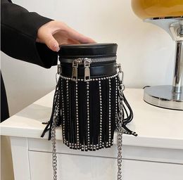 Factory sales women shoulder bags 2 Colours street spice tassel bucket bag this year's popular personality rivet handbag cylinder shaped leather backpack 62128#