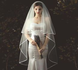 Elegant Bridal Veils Bride Veil Fingertip Length TwoLayer Simple Handmade Noble Tulle Ribbon Edge Wedding Veil Headwear Comb5022372