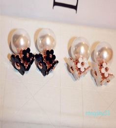 New fashion unique luxury designer double sided beautiful flower pearl elegant stud earrings for woman girls7219169