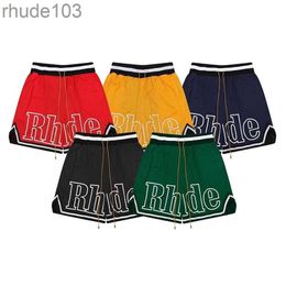 Designer Shorts Rhude Mens Mesh Short Summer Fashion Beach Elastic Band Pants Men High Quality Street Wear Red Blue Black Purple Pants UBCV