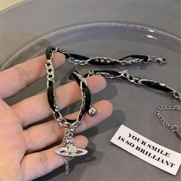 Viviennely Westwoodly Planet Surrounding Tassel Necklace Spicy Girl Black Leather Rope Short Necklace Personalized Saturn Layer 55965