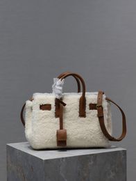 Lamb wool bag, equipped with long shoulder straps, can fit anything into the bag