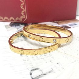 Men Women Sizes High quality classic styles Snap Bangles titanium steel Jewellery gold plated bangles men and women couple bracelet 273g