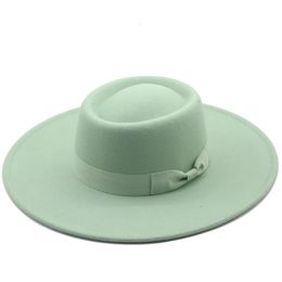 The ringshaped flattop wool felt big eaves Bowler hat ladies spring and autumn winter fashion Woollen 231229