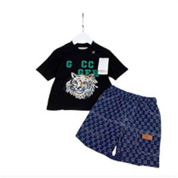 Летние новые мужские и женские хлопковые повседневные шорты с короткими рукавами с принтом, комплект из двух предметов, большая детская брендовая одежда, размер 90-160 см a028