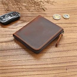 Vintage Genuine leather mens designer coin purses cowhide zipper male short style fashion casual zero card wallets no583