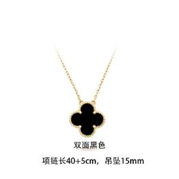 wholesale European and American brands titanium steel four-leaf clover titanium steel necklace female colorfast black and white double-sided four-leaf clavicle.