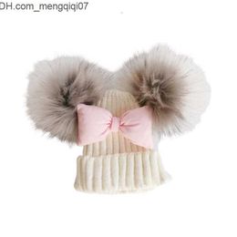 Caps Hats Caps Hats born winter toddler baby kids bow tie Butterfly Knot Melamed hat cap beanie with 2 pom poms ears for boys and girls props 221125 Z230701