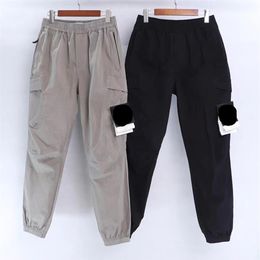 21SS Men Cotton Pants Basic Compass Badge Embroidered High Quality Tooling Pocket Trousers Sport Wear Casual Pants221O