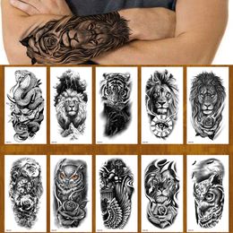 Temporary Tattoos 100pcs Wholesales Temporary Tattoo Sticker Lion Tiger Wolf Snake Flower Black Body Arm Fake Sleeve Waterproof Man Women 230701