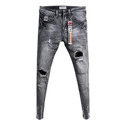 Whole Fashion Casual teenagers cowboy Korean trendy knee ripped hole skinny jeans mens raw edge fashion stretch pants 201111276Q