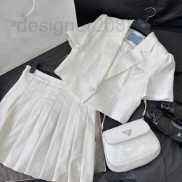 Two Piece Dress designer Fashionable and casual temperament, celebrity style, age reducing set, one button bubble sleeve lapel short top+pleated half skirt XUY0