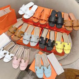 luxury brand Slippers Sandals Slides female summer fashion outside wear new style net red flat bottom tourism beach a word leather sandals