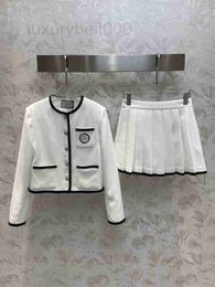 Two Piece Dress designer Fashionable casual set skirt with round neck, single breasted, contrasting Colour embroidered jacket pleated short B6DV