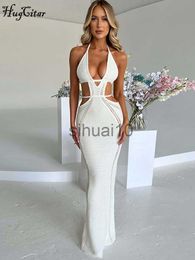 Casual Dresses Hugcitar Crochet Halter Sleeveless Backless Solid Hollow Out Bandage Sexy Slim Maxi Prom Dress 2022 Winter Festival Party Outfit J230705