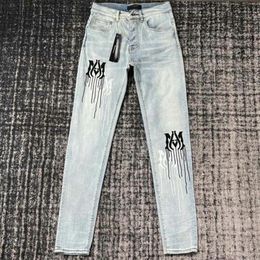 HM565 quality Mens jeans Distressed Motorcycle biker jean Rock Skinny Slim Ripped hole stripe Fashionable snake embroidery Denim p265L