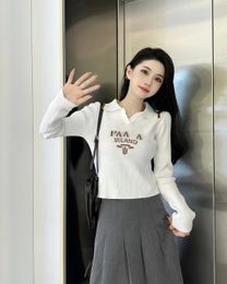 سترة نسائية سترة أبيض بطاقة بيضاء اللون v-neck pullover في خريف 2023 أزياء النساء شارع الملابس النسائية سترة نسائية