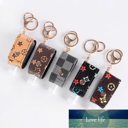 New Keychain PU Leather Colour 30 Ml Trapezoidal Squeeze Hand Sanitizer Travel Bottle Leather Case Wholesale