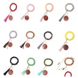 Key Rings 11 Colours Wooden Bracelet Keychain With Tassels Keys Diy Wood Fibre Pandent Woodwooden Bead Bangle Decorate Fashion Drop D Dhmpk