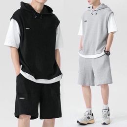 Men's Tracksuits Summer Large Size Sports Suit Breathable Casual Wear Wild High Street Chic Fake Twopiece Tshirt Simple Shorts 230711