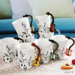 Mugs 230ml Ceramic Electric Guitar Musical Instrument Milk Coffee Cup Note Water Cup Violin Piano Drum Mug Music Cup R230712