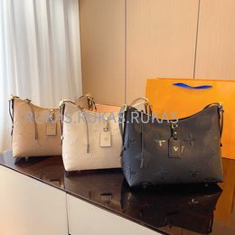 2023 explosão bolsa moda tendência impressão design marca de luxo bonito tecido couro vaca simples integrado saco grande capacidade m46293